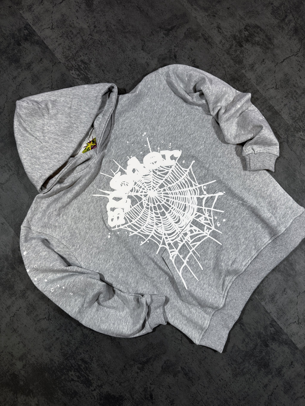 Spider Worldwide) hoodie and sweatpants set.