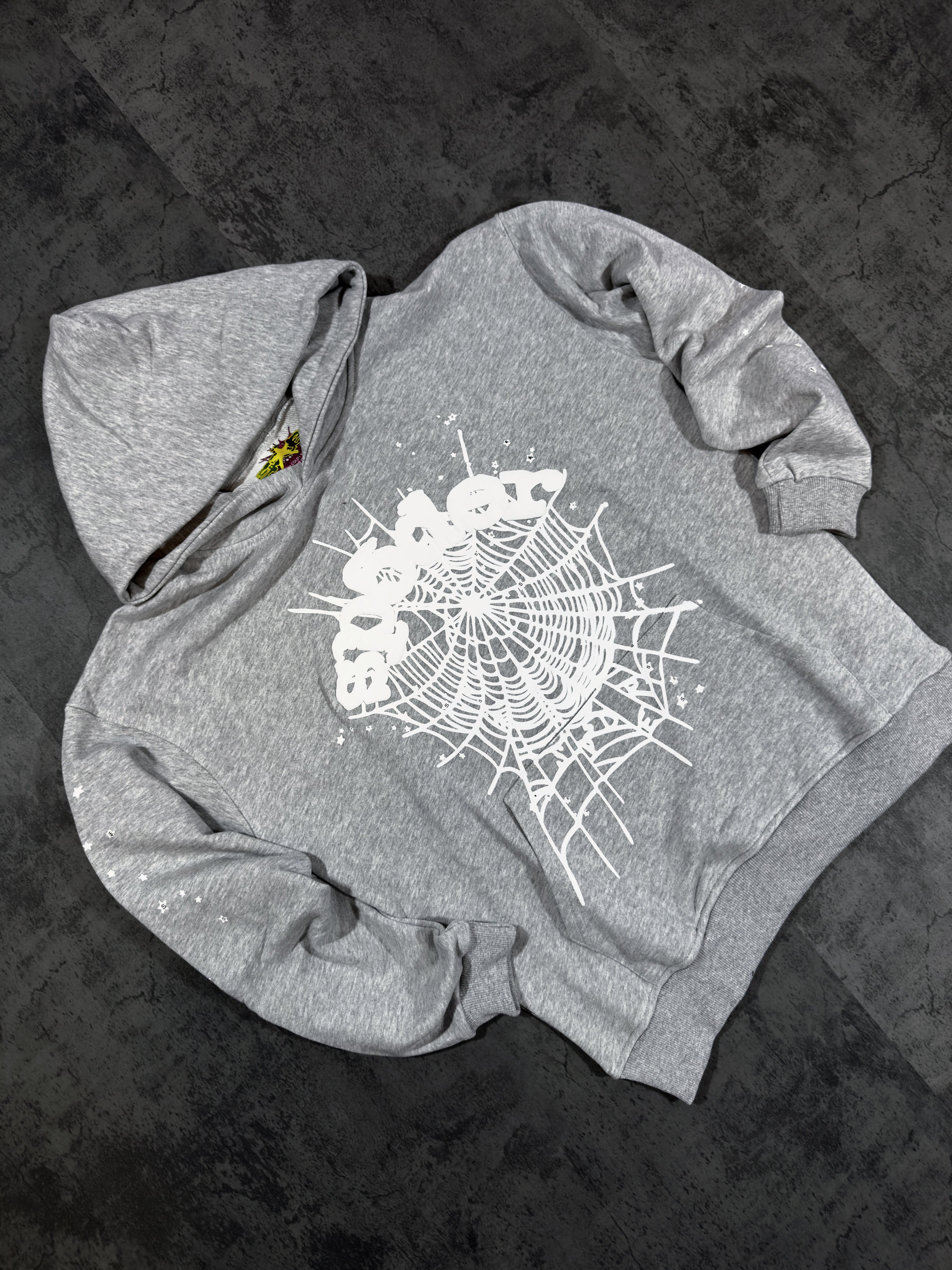 Spider Worldwide) hoodie and sweatpants set.