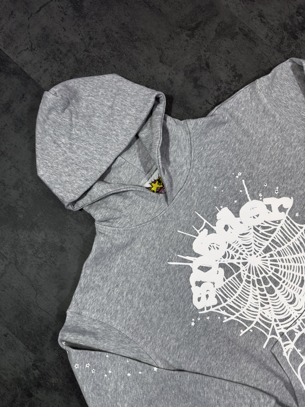 Spider Worldwide) hoodie and sweatpants set.
