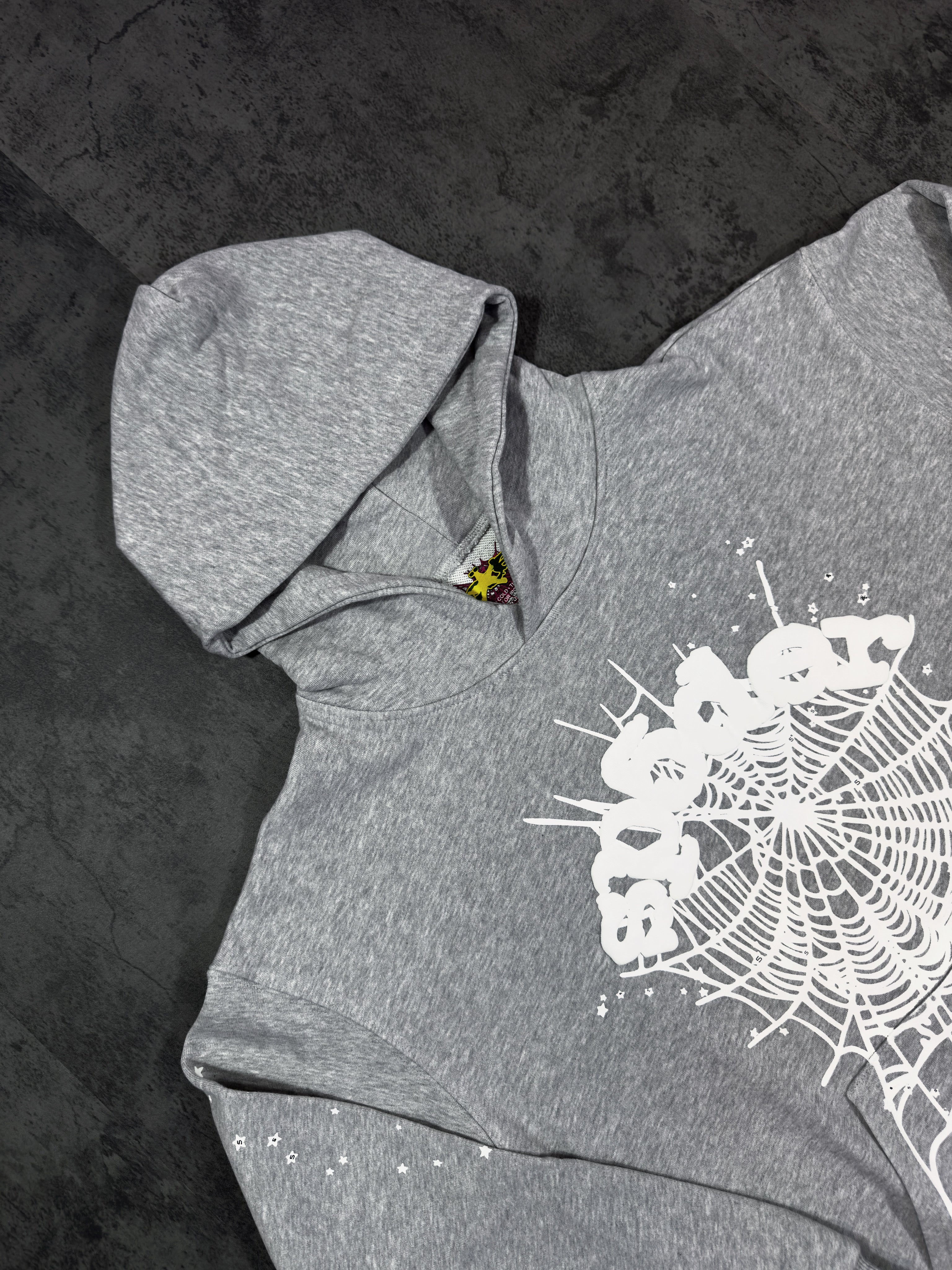Spider Worldwide) hoodie and sweatpants set.