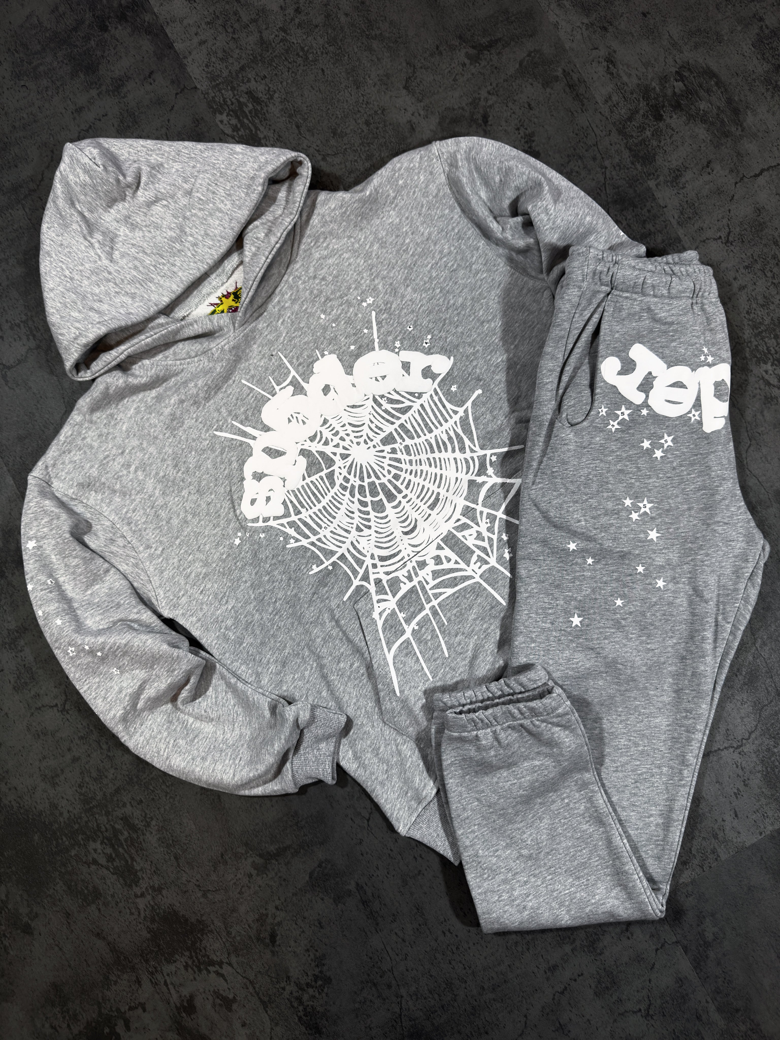Spider Worldwide) hoodie and sweatpants set.