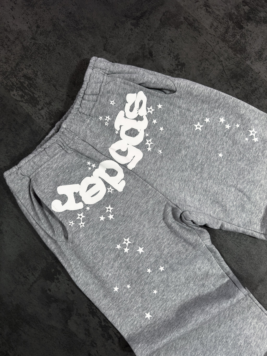 Spider Worldwide) hoodie and sweatpants set.