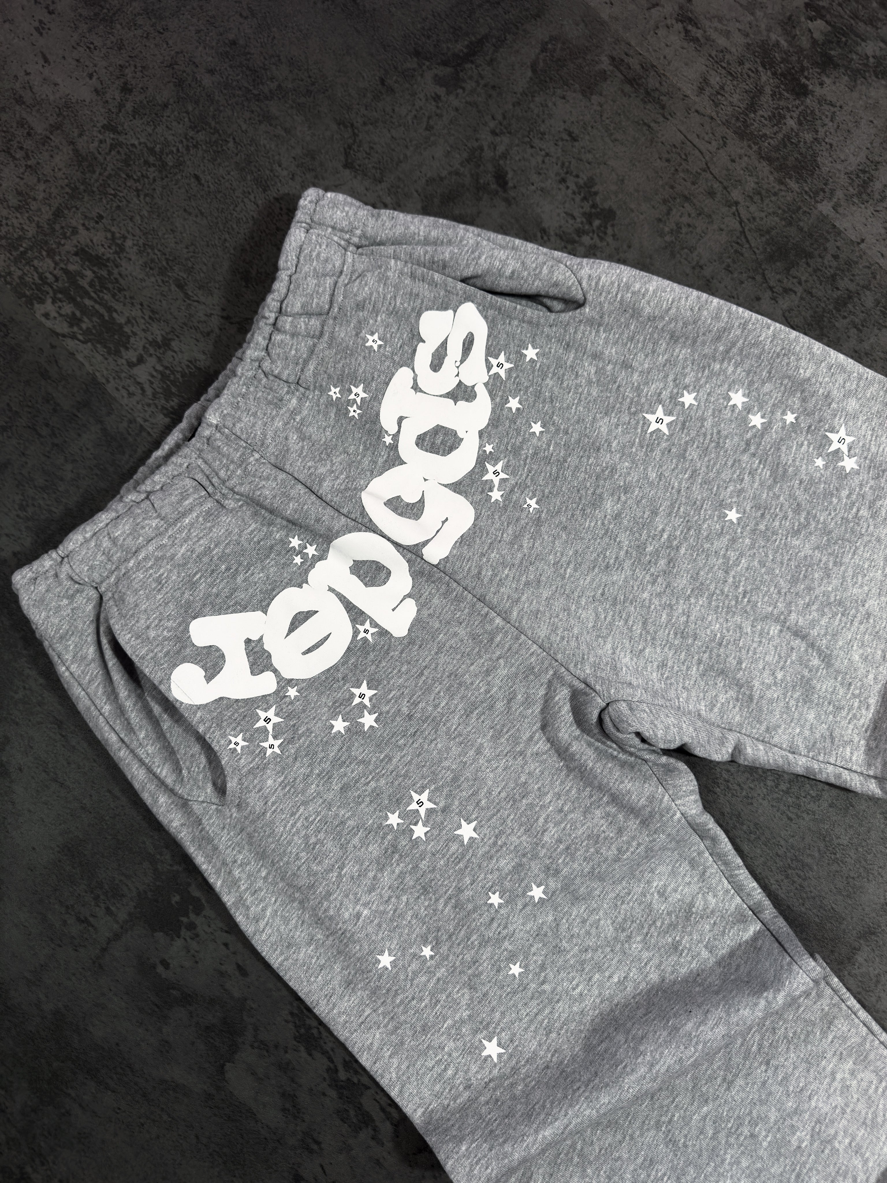 Spider Worldwide) hoodie and sweatpants set.