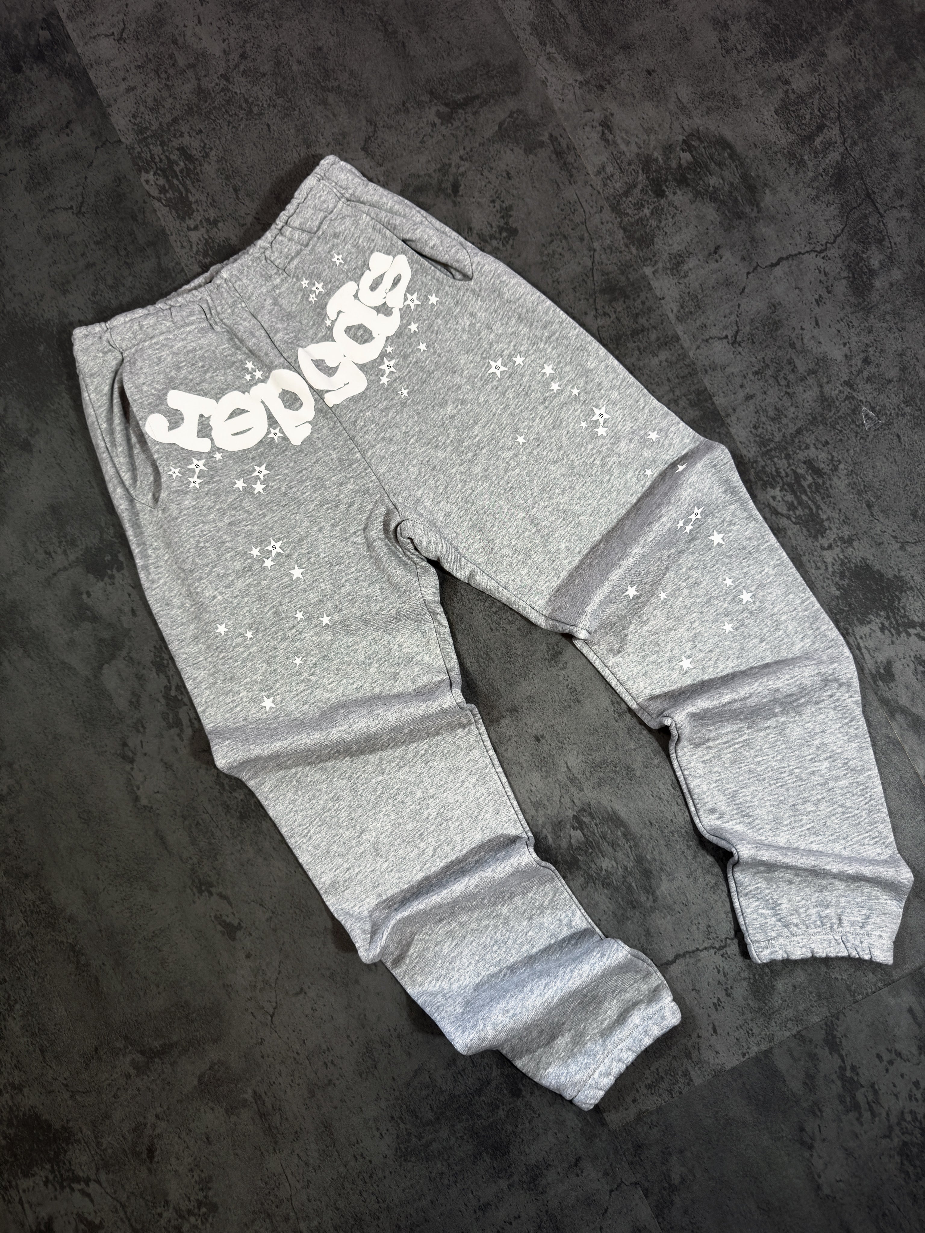 Spider Worldwide) hoodie and sweatpants set.